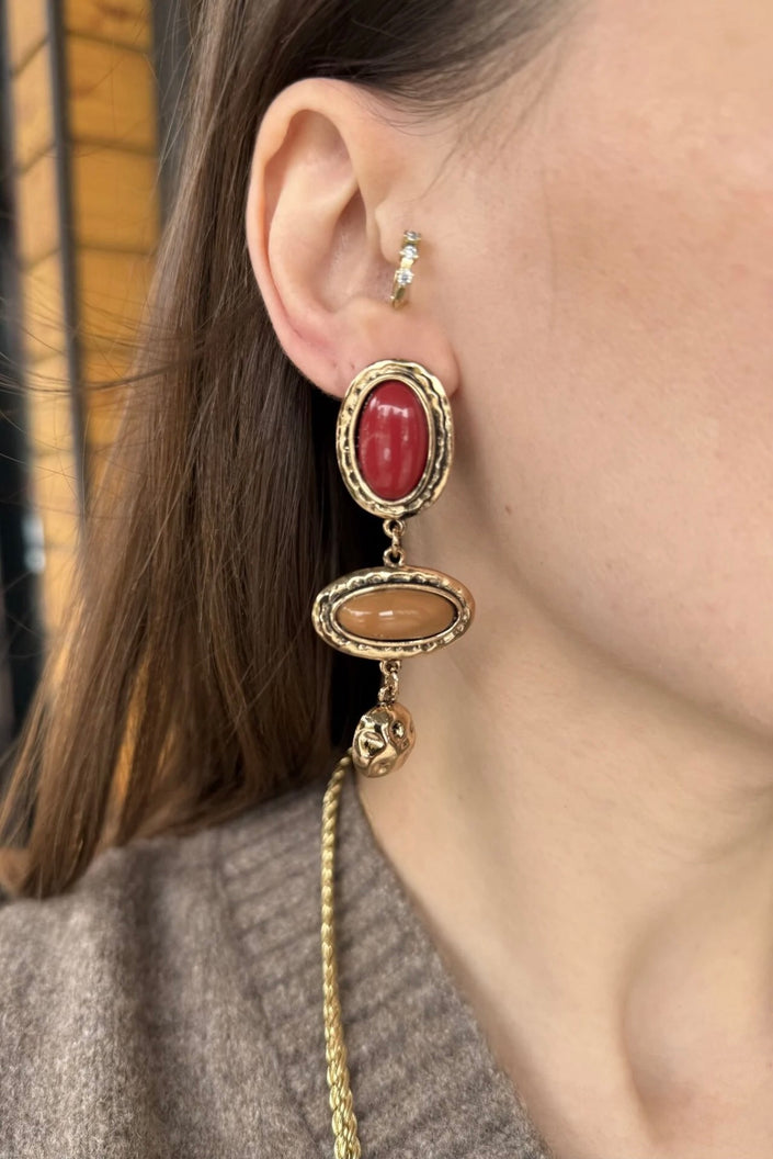 Oval Sıra Sallantılı Marka Model Küpe